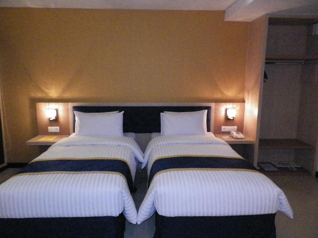 D'Best Hotel Pasar Baru Bandung Quarto foto
