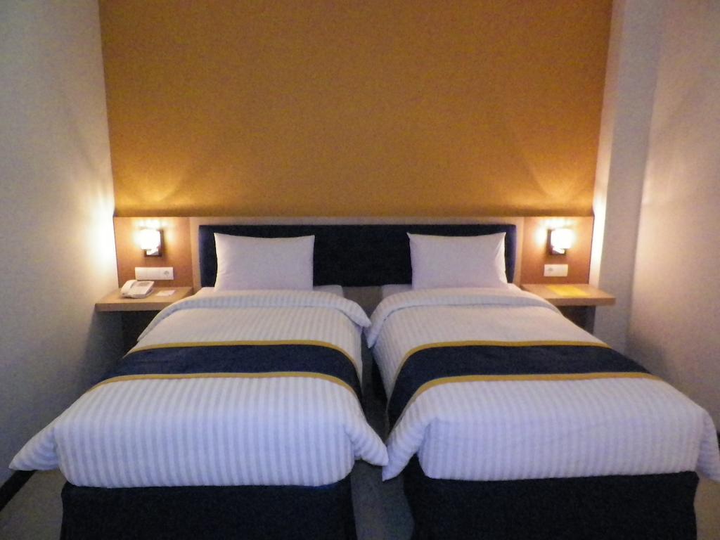 D'Best Hotel Pasar Baru Bandung Quarto foto
